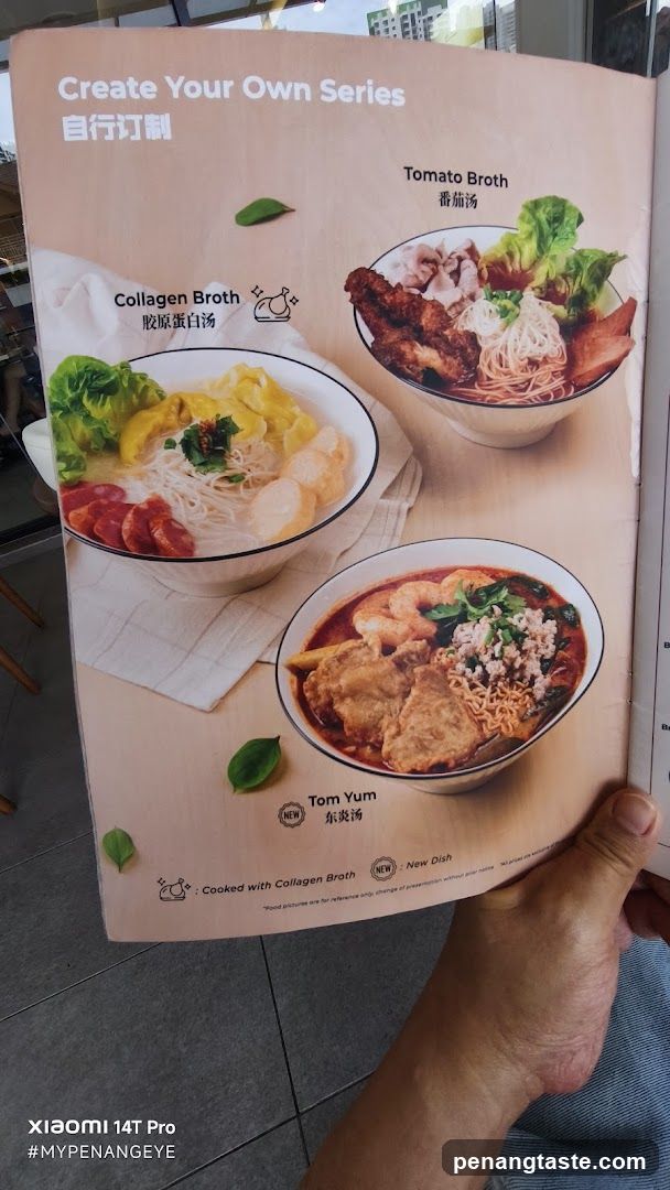 Menu Page Held by Hand