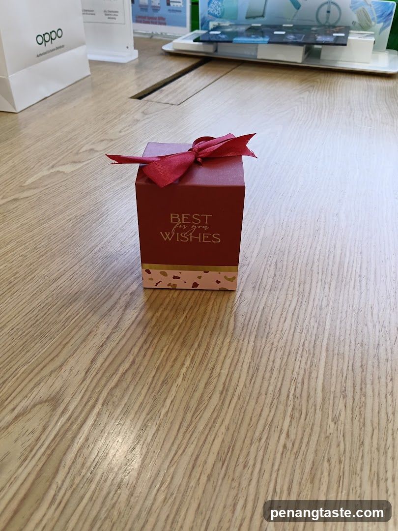 Red Gift Box on Wooden Floor