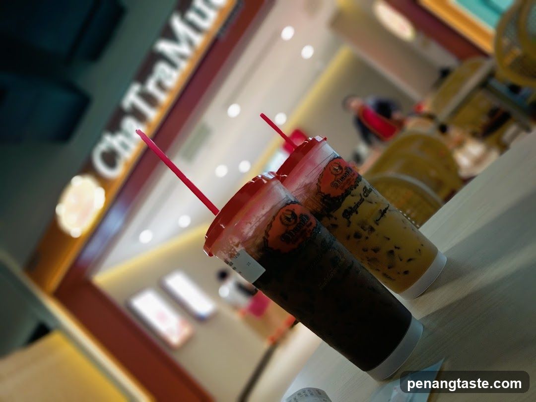 Two iced beverages at a tea shop