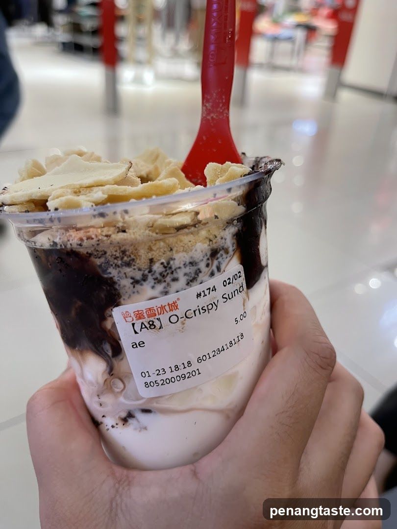 Hand holding dessert cup