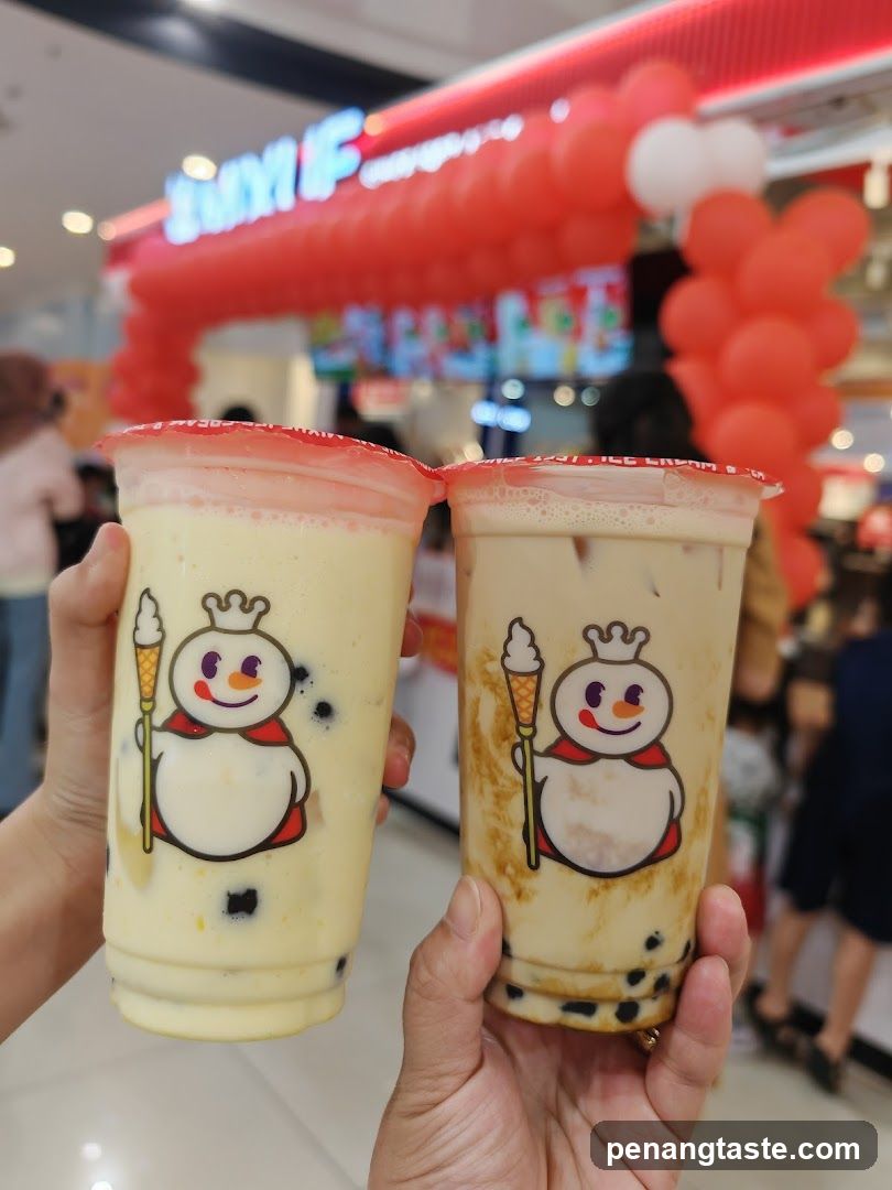 Two beverages held up in a shopping mall