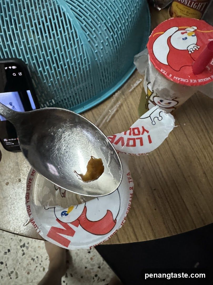 Tabletop with beverage cup and spoon