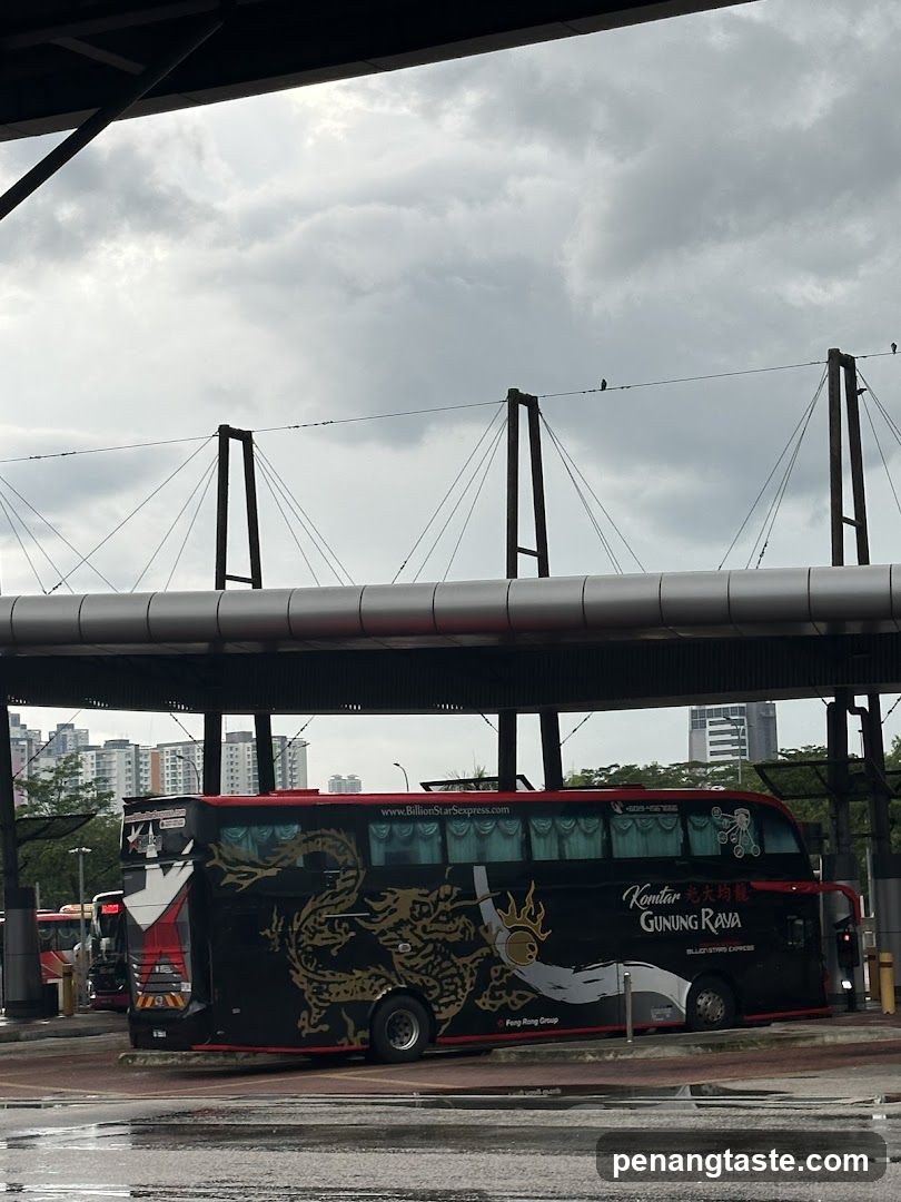 Bus at terminal under overpass