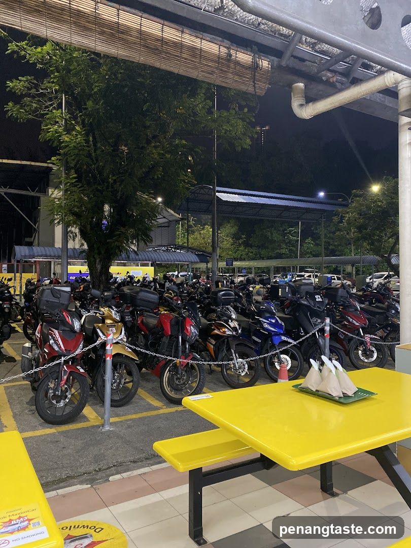 Outdoor seating area with motorcycle parking