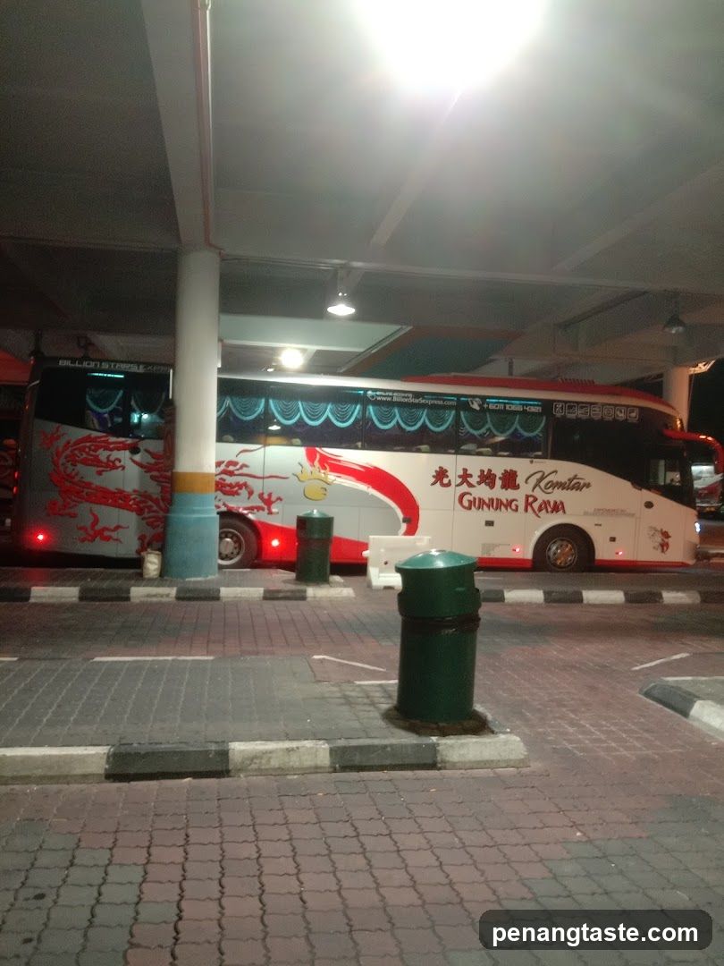 Bus at night under shelter