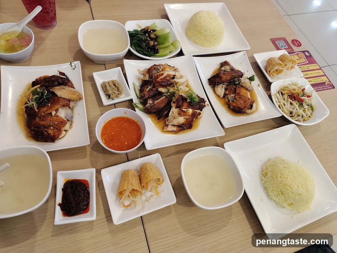 Table of Hainanese Chicken Rice Dishes
