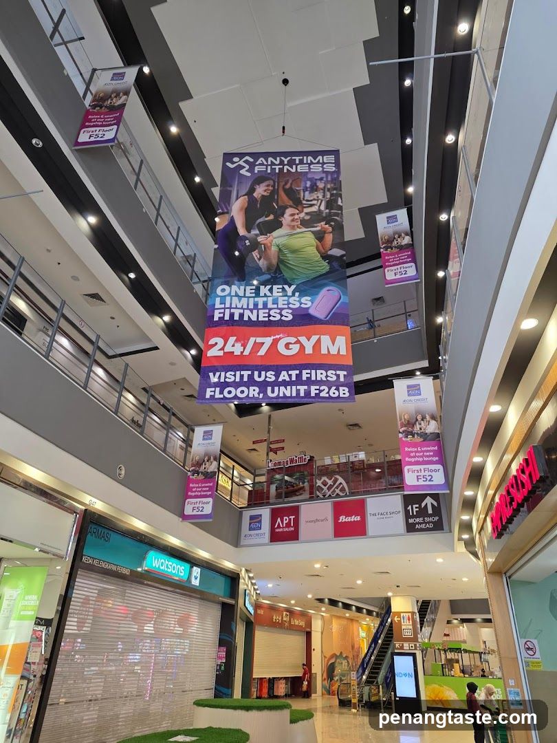 Interior of shopping mall with promotional banners