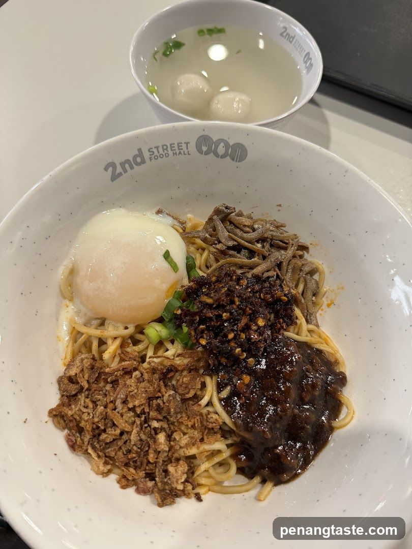 Noodle dish with egg and toppings