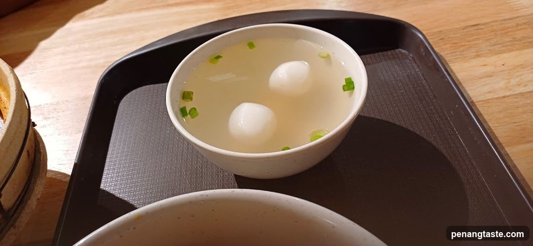 Bowl of soup on tray