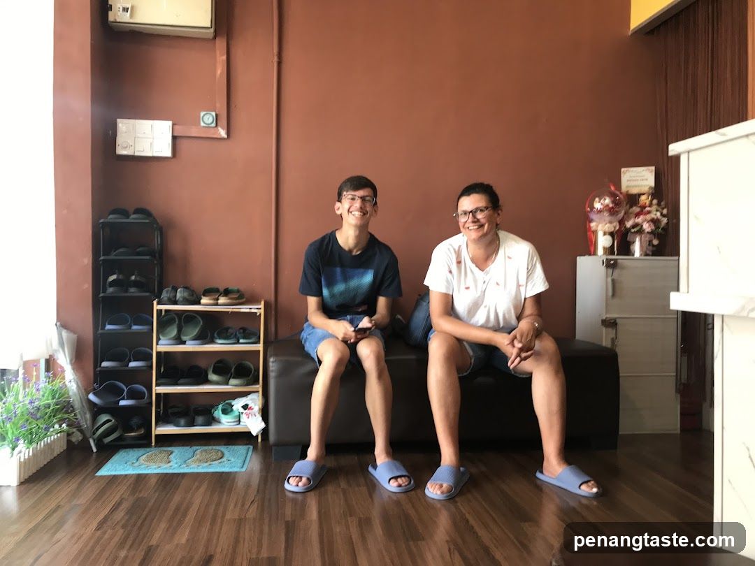 Two people sitting in a room