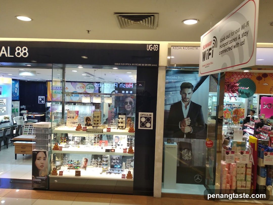 Storefront with display cases and advertisements