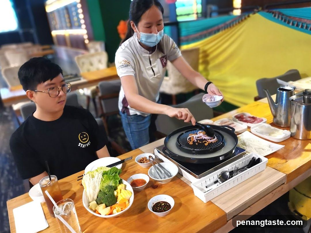 Restaurant Interior with Staff Serving Food