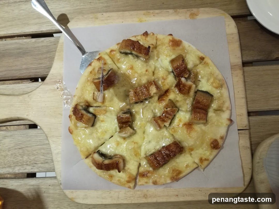 Pizza on wooden serving board