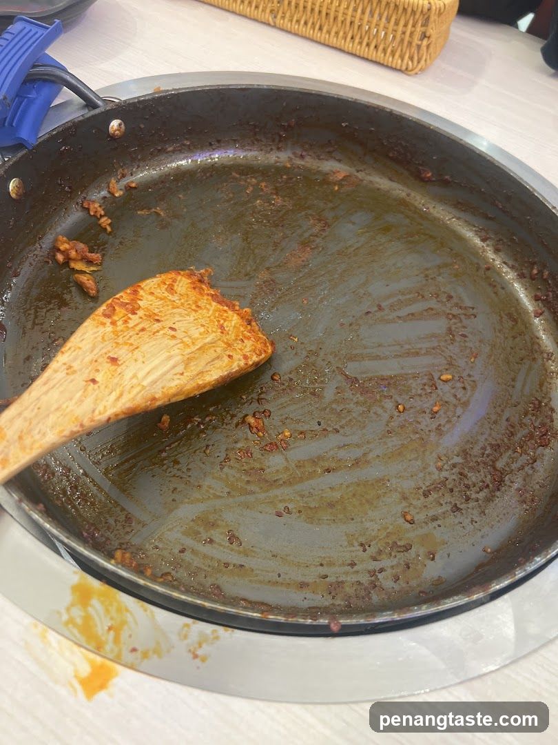 Empty Pan with Wooden Spatula