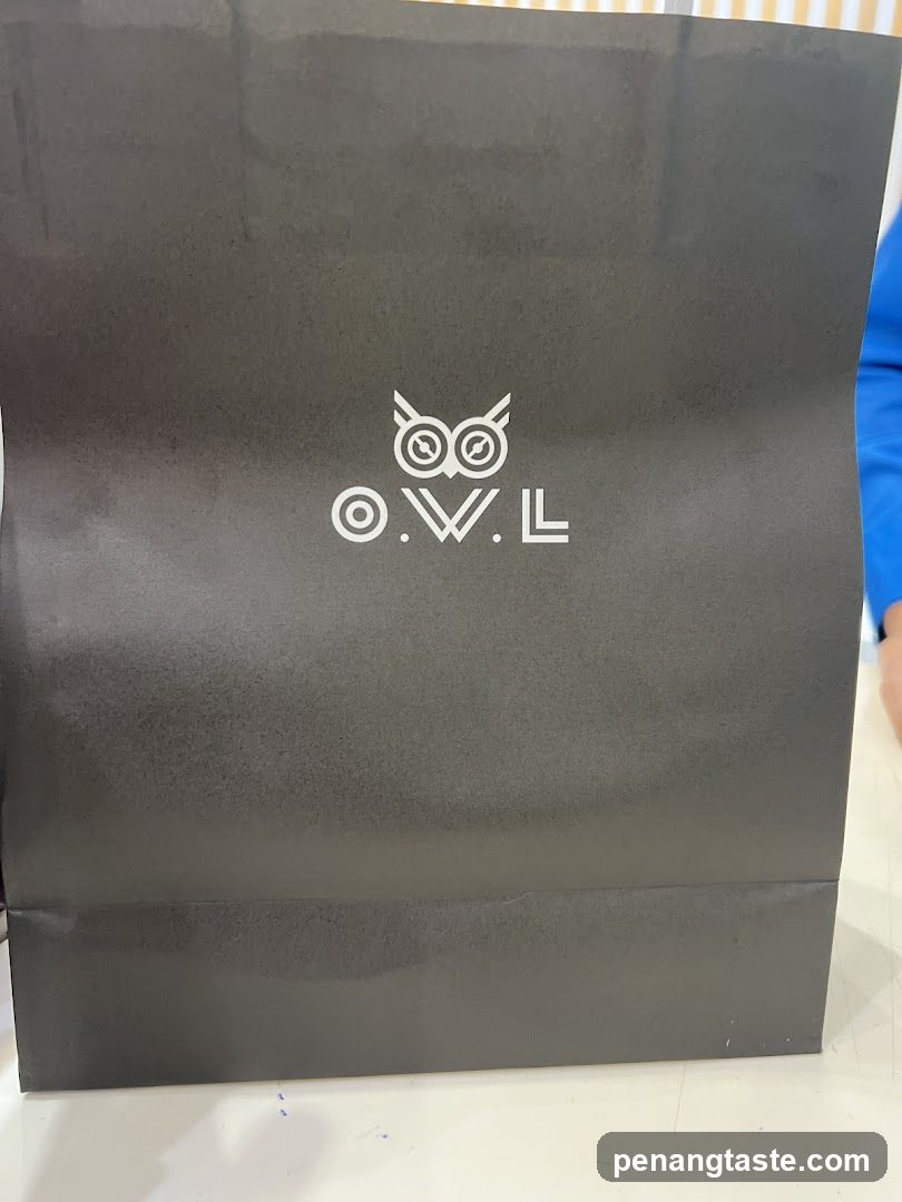 O.W.L. branded shopping bag