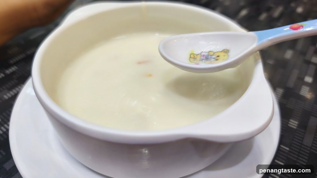 Soup in bowl with spoon