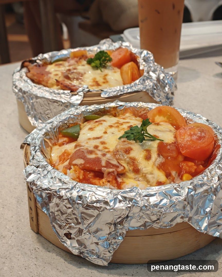 Food served in foil-wrapped bamboo baskets