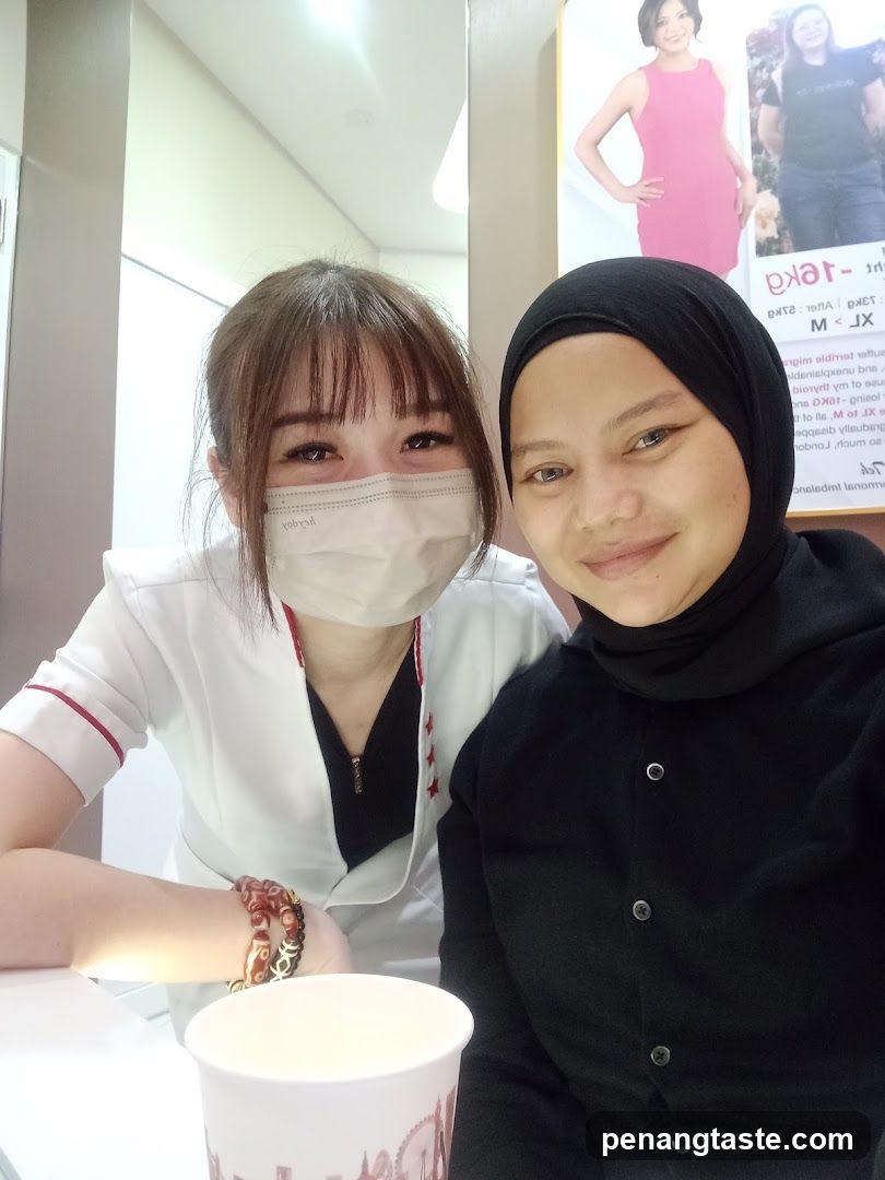 Two individuals in a clinic or medical office