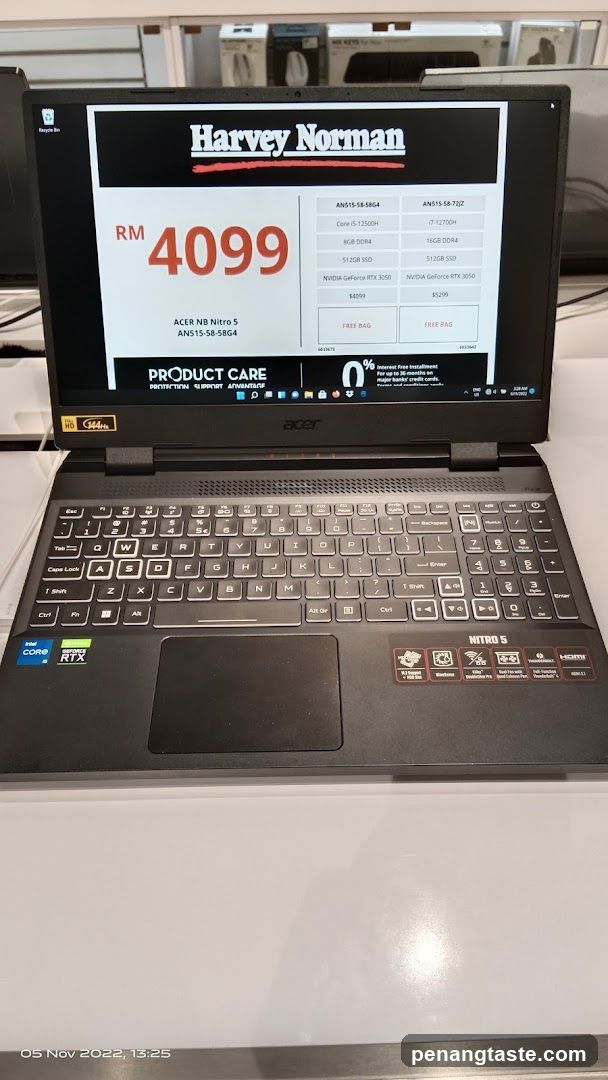 Acer Nitro 5 Laptop Displaying Harvey Norman Advertisement