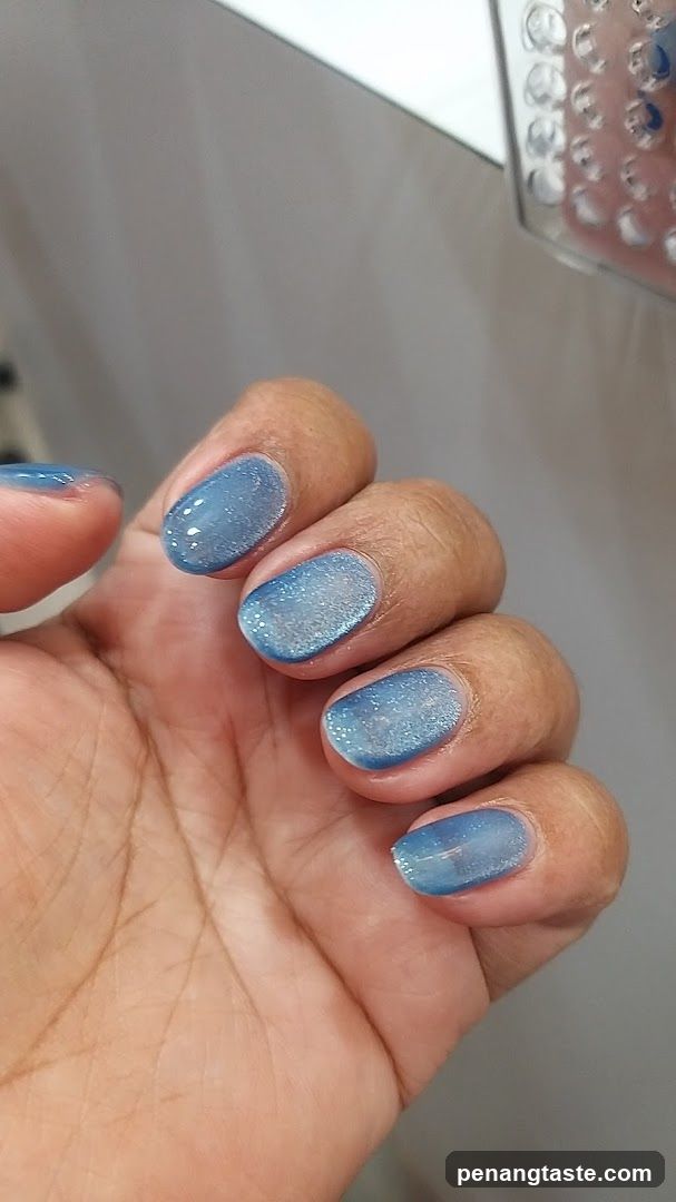 Hand with Blue Nail Art