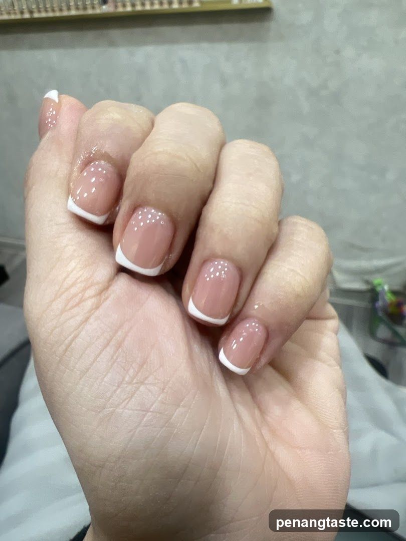 Hand with French manicure