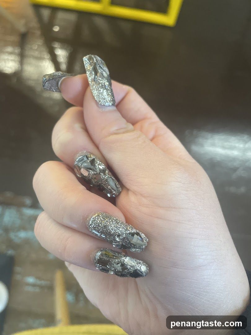 Hand with decorative nails