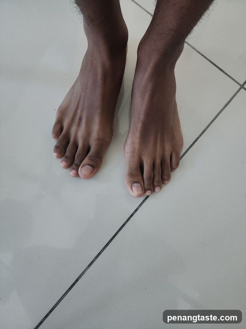 Feet on tiled floor
