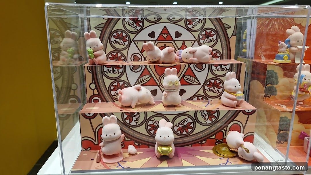Display Case with Rabbit Figurines