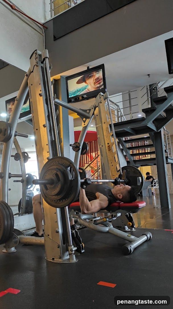 Gym Interior with Bench Press Exercise