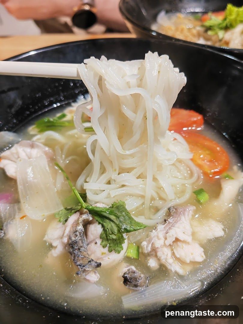 Noodle Soup with Fish and Tomatoes