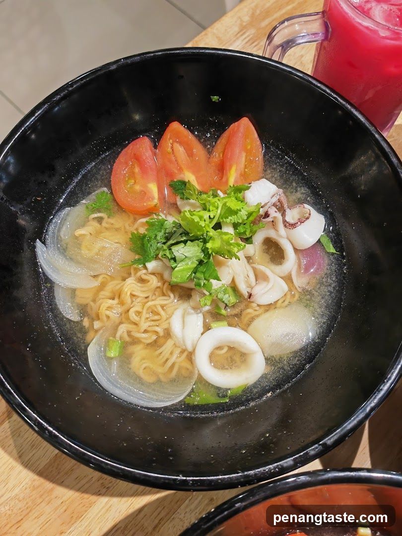 Noodle Bowl with Tomatoes and Squid
