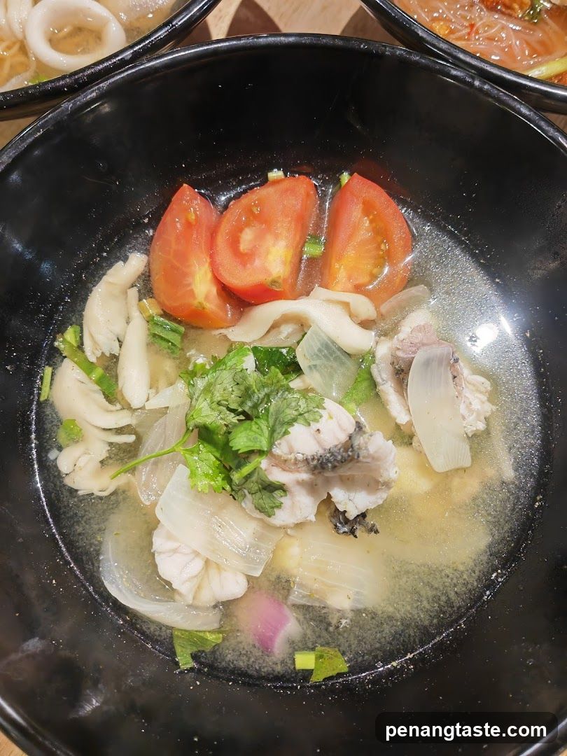 Fish Soup with Tomatoes and Onions