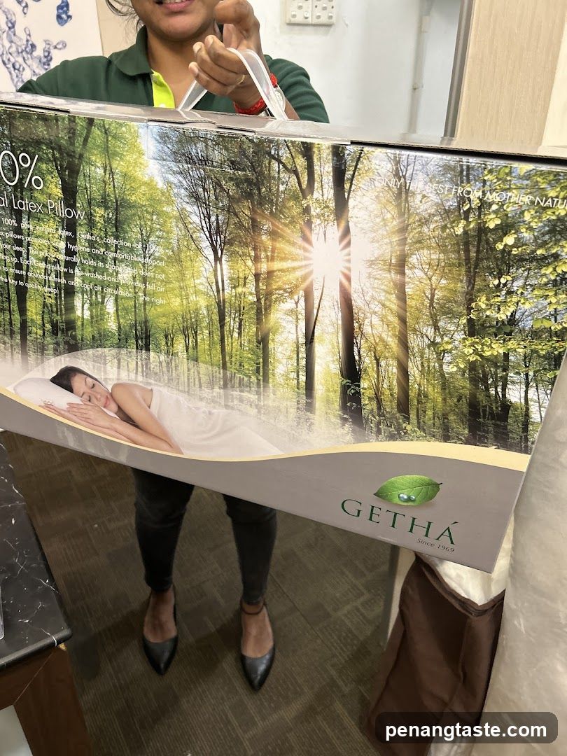 Person holding a pillow box