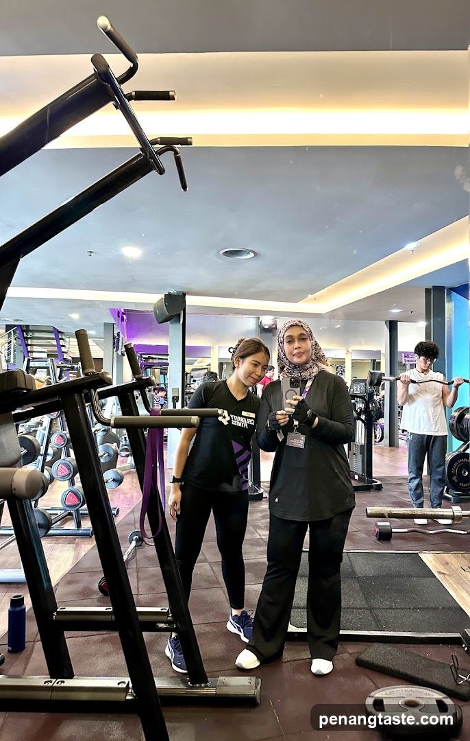 Gym Interior with Staff and Members