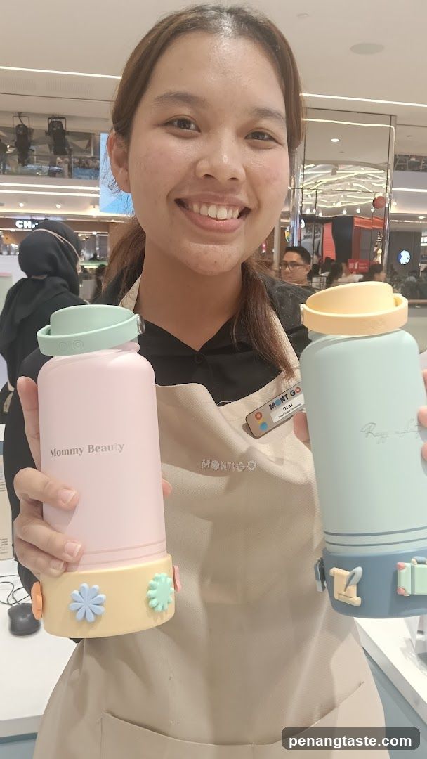 Staff holding products in mall interior