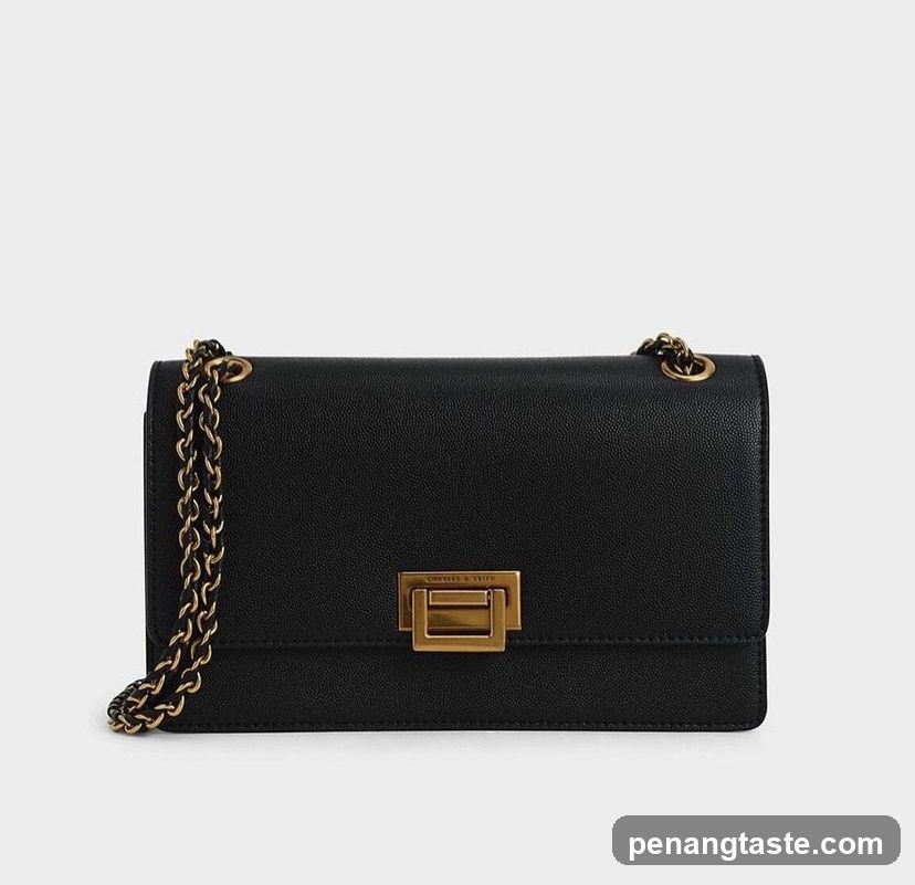 Black Leather Crossbody Bag with Gold Chain