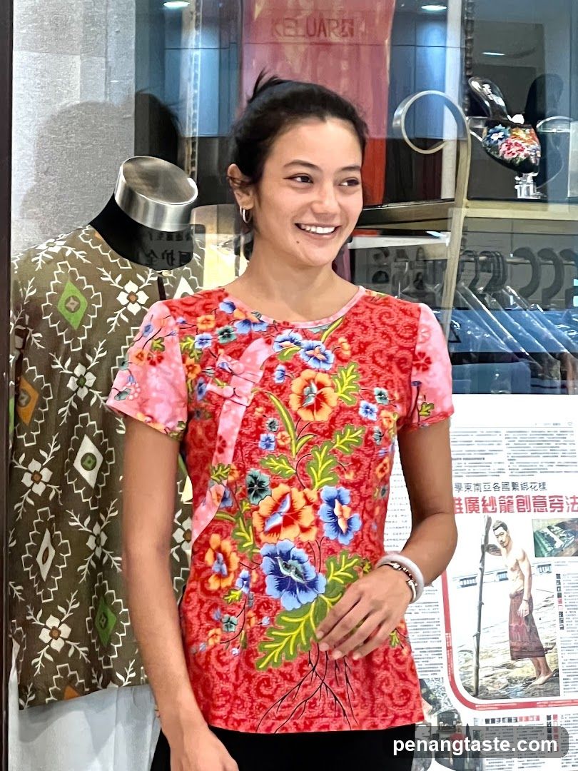 Woman in floral shirt