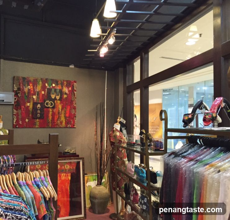 Clothing store interior with artwork and apparel