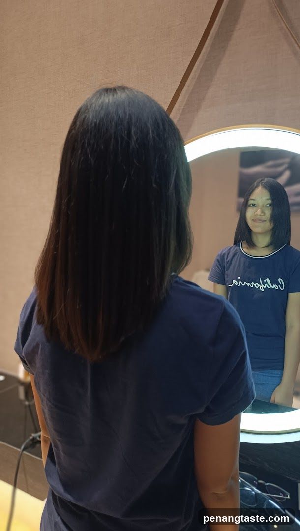 Woman looking in mirror
