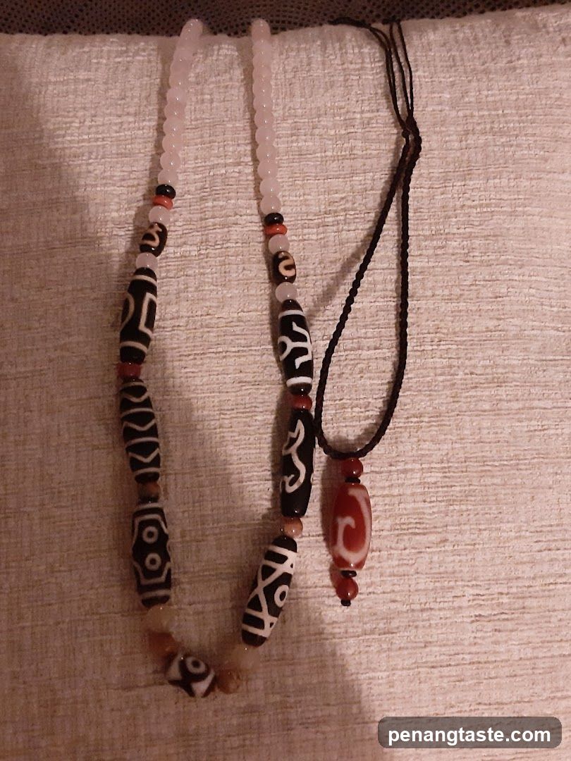 Two necklaces with dzi beads