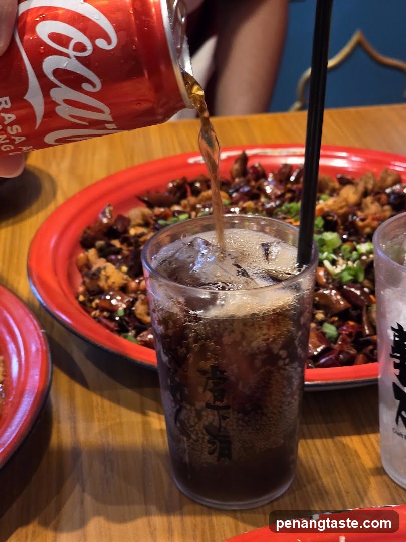 Pouring Coca-Cola into a Glass