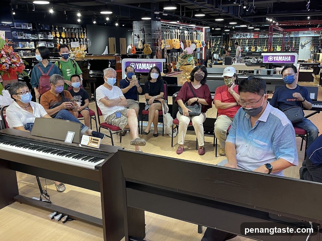 People attending a piano demonstration