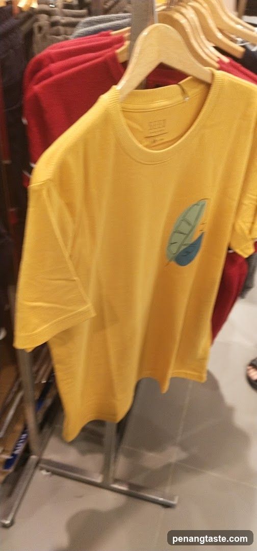 Yellow T-shirt with leaf graphic