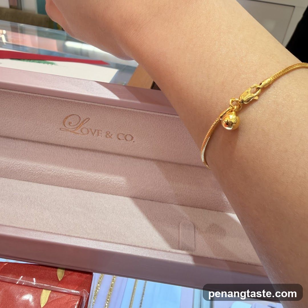 Gold Bracelet with Charm