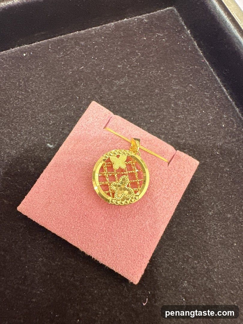 Gold Pendant with Butterfly Design