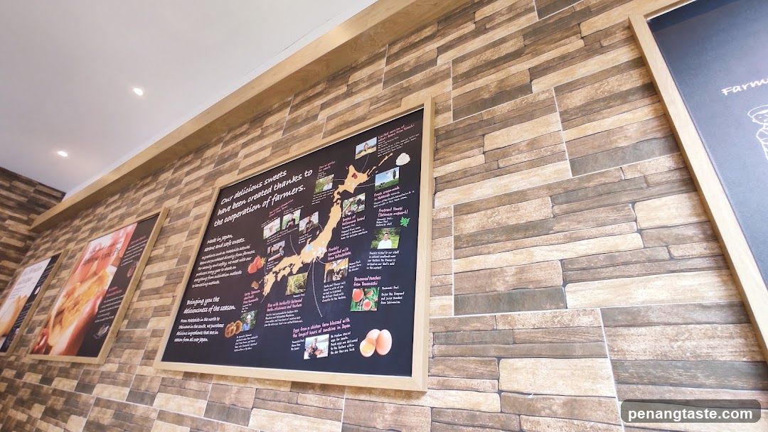 Information Boards on a Stone-Patterned Wall