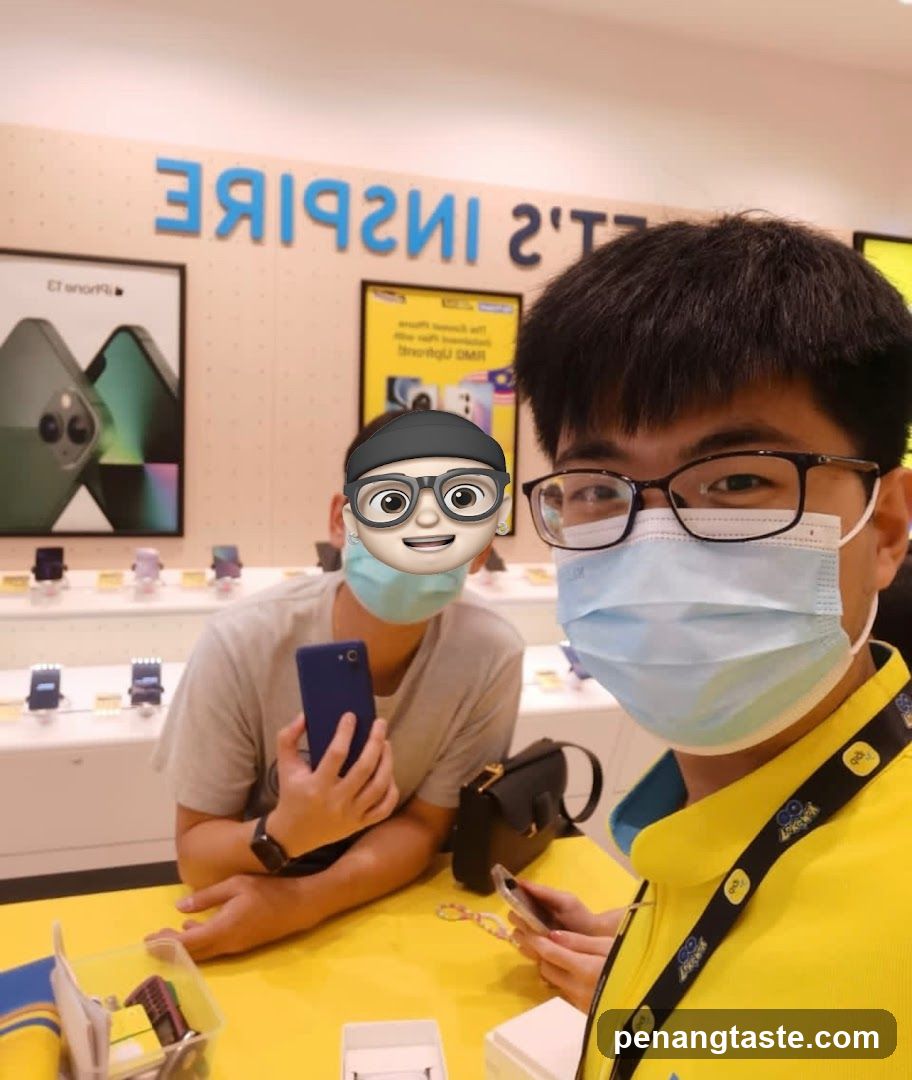 Two people in a phone store