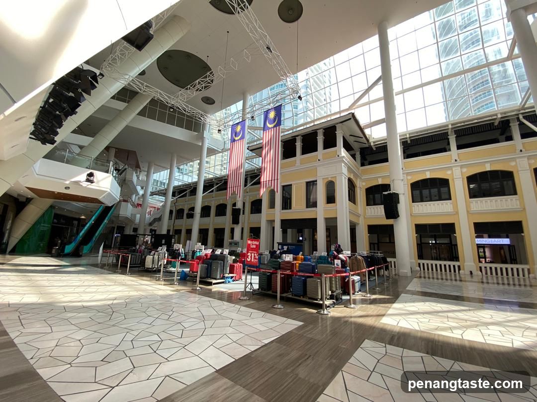 Indoor shopping mall with luggage sale