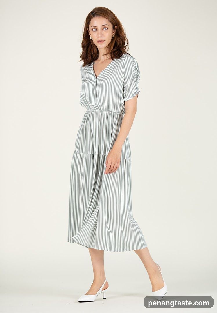 Woman in Striped Dress