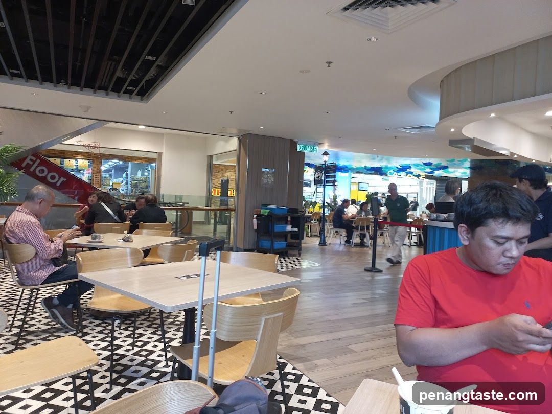 People dining in a food court
